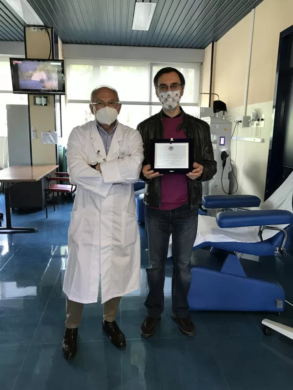 Virginio Fulvio Zadro premiato dal Dr. Toschi